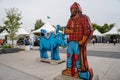 Falcon Heights, MN - August 25, 2019: The Paul Bunyan and Babe the Blue Ox statues at the West End Entrance of the Minnesota State Royalty Free Stock Photo