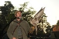 Falconer with Falcon,falco cherrug .