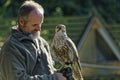 The falconer Mursa showing out falcon Royalty Free Stock Photo