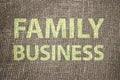 Family Business words printed on burlap canvas. Small business startup concept