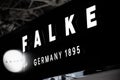 FALKE outlet boutique modern lighting signage logo. Famous german fashion wear brand