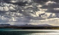 Falkland Islands,Malvinas sun shining through dramatic clouds