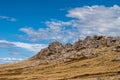 Wide windswept rocky outcrop in landscape on Falklands, UK