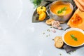 Fall autumn roasted orange pumpkin carrot soup with garlic Royalty Free Stock Photo