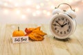 Fall Back Daylight Saving Time concept on wooden board Royalty Free Stock Photo