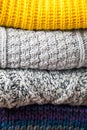 Fall Background from close up stack or pile of fashionable knitted colors wool clothes or sweaters Royalty Free Stock Photo