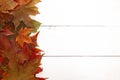 Fall Border of Authenic Leaves on a Wooden Background Royalty Free Stock Photo