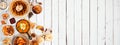 Fall breakfast or brunch buffet side border against a white wood banner background. Top view with copy space. Royalty Free Stock Photo