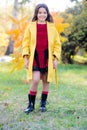 Fall bucket list. Child cheerful on fall walk. Warm coat best choice for autumn. Autumn season concept. Kid girl wear