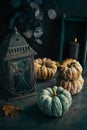 Fall candle decoration with pumpkins, wooden home decor still life scented candle Royalty Free Stock Photo