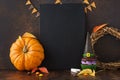 Fall chalkboard background with pumpkin and Halloween treats