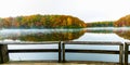 Fall Color and Fishing Pier Reflection on Boley Lake Royalty Free Stock Photo