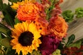 fall color flowers: yellow sunflowers, Peach roses, purple puff, orange and pink flowers
