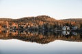 Fall colors of houses on the Lake and Mountain Royalty Free Stock Photo