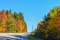 Fall colors on a lonely stretch of highway Royalty Free Stock Photo