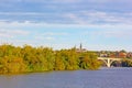 Fall colors of Potomac riverside and Key Bridge, Washington DC. Royalty Free Stock Photo