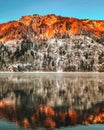 Fall Colors Reflected in a Calm Lake. Autumn on the lake. Royalty Free Stock Photo