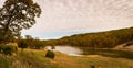 Cloudy Sky by a stream in the Ozarks mountains of Missouri Royalty Free Stock Photo