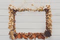 Fall decoration handmade frame on white wood background copy space