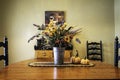 Fall dinning room with flower bouquet Royalty Free Stock Photo