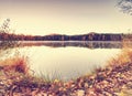 Fall evening on the lake. Beautiful forest lake Royalty Free Stock Photo