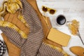 Fall clothing flat lay in mustard yellow color palette