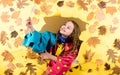 Fall fashion. Waterproof accessories for children. Kid girl happy wear waterproof cloak. Waterproof accessories make