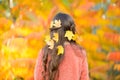 Fall festival. Simple happiness. Kid enjoy autumn outdoors. Meet autumn. Little girl cute child gorgeous long hair maple
