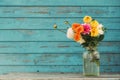 Fall flowers in glass jar