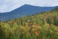 Fall foliage and mountains of the Bigelow Range in Maine.