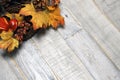 Fall Folliage against wooden table background