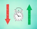 Fall and growth in business. Clock, red arrow down, green arrow up Royalty Free Stock Photo