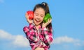 Fall harvest homegrown vegetables. Choose which. Alternative decision concept. Kid girl hold red and green peppers sky