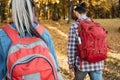 Fall journey couple backpacks autumn nature park