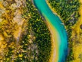 Fall landscape. A drone view of the river in the woods. An aerial view of an autumn forest. Winding river among the trees. Royalty Free Stock Photo