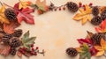 Fall leaf border with pinecones and berries on textured background. Autumn banner Royalty Free Stock Photo