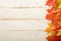 Fall leaves frame on whooden background Royalty Free Stock Photo