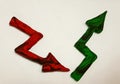 descending arrow in red with black and ascending arrow in green with black, made in plasticine