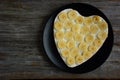 Heart shaped chocolate cake with banana slice Royalty Free Stock Photo