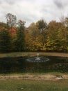 Fall in the country with a fountain Royalty Free Stock Photo