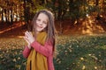 Fall nature park happy young girl autumn sunny day Royalty Free Stock Photo