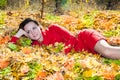 Fall. Portrait of beautiful young woman in autumn park Royalty Free Stock Photo