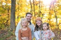 Fall portrait of young family at golden hour Royalty Free Stock Photo