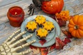 Fall pumpkin spice cupcakes with creamy frosting and autumn toppings. Halloween decorations and cupcakes. Royalty Free Stock Photo