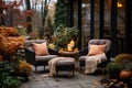 Beautiful fall residential backyard terrace with outdoor chairs, cozy autumn vibes Royalty Free Stock Photo