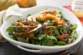 Fall salad with greens and acorn squash