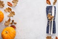 Fall season background with cutlery, leaves and pumpkins Royalty Free Stock Photo