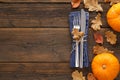 Fall season background with cutlery, leaves and pumpkins Royalty Free Stock Photo