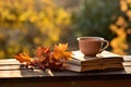 Cup of hot tea and book in the park, autumn leaves , AI Generated Royalty Free Stock Photo