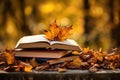 Cup of hot tea and book in the park, autumn leaves , AI Generated Royalty Free Stock Photo